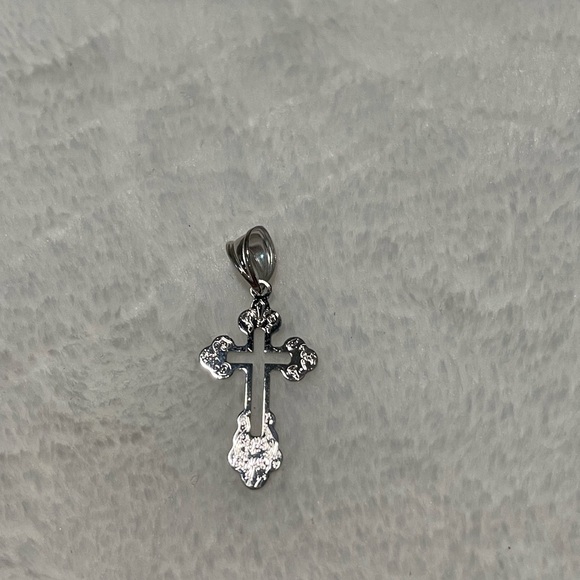 14k white gold cross pendant.